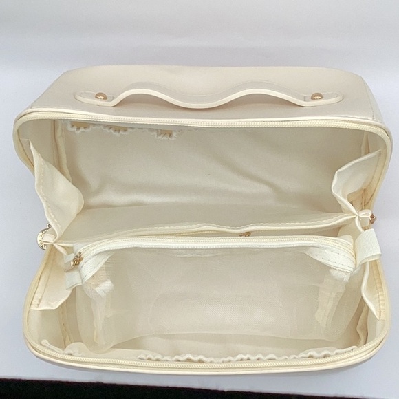 Cream Cosmetic Bag with Smooth Material and Curved Handle - Picture 4 of 10